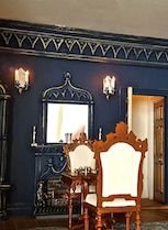 This atmospheric gothic room by Jonathan Hescott uses C9 cornice and PF10 and OM4 fireplace set